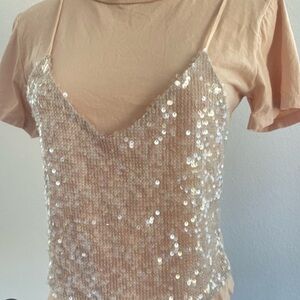 Shimmer in style with this elegant sequin beige top. Perfect for a night out or